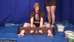 girl_trapped_in_stocks_and_sploshed_003